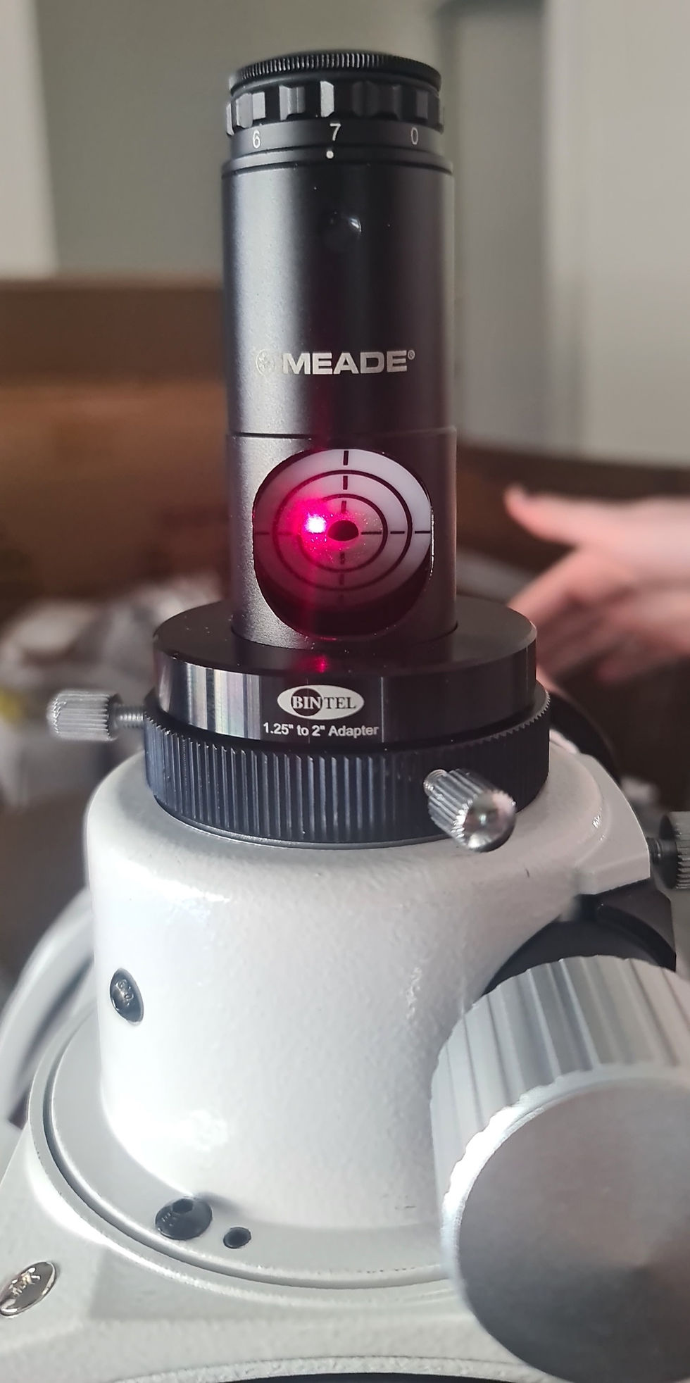A collimation device inserted into a telescope